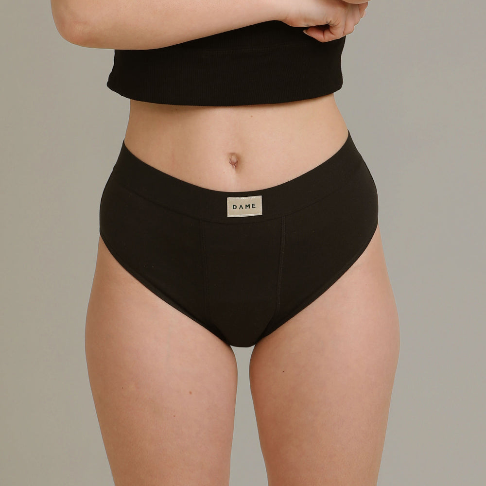 DAME's Period Pants - High Waist - in studio with neutral background